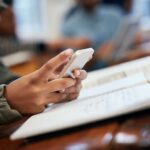 Student using a phone in school